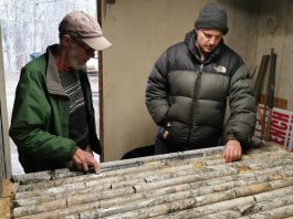 Don Black and James Bycroff examine Army Road Spodumene core from the lithium project
