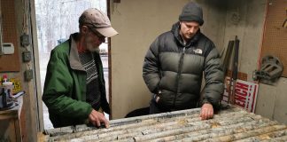 Don Black and James Bycroff examine Army Road Spodumene core from the lithium project
