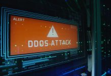 DDoS attacks: How are threat actors developing more innovative attacks? Close up shot of a computer login screen in a modern data center then appear message ddos attack