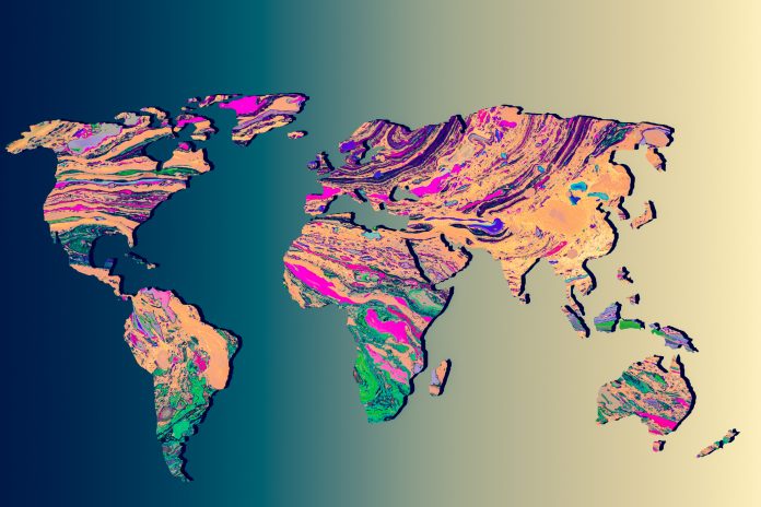 Roughly outlined world map with a colorful background patterns, earths continents