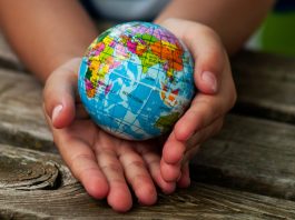 A,Boy,With,A,Ball,Of,The,World,Or,Planet