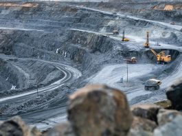 Work,Of,Heavy,Equipment,In,An,Open,Pit,For,Gold,lithium,land,rush