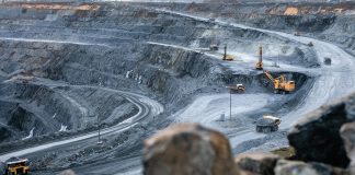 Work,Of,Heavy,Equipment,In,An,Open,Pit,For,Gold,lithium,land,rush