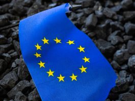 European,Union,Flag,Against,The,Background,Of,Coal,,Concept,,Coal,Rare,Earth,Supply,Chain