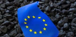 European,Union,Flag,Against,The,Background,Of,Coal,,Concept,,Coal,Rare,Earth,Supply,Chain
