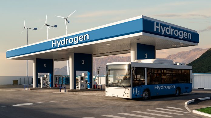 Fuel,Cell,Bus,At,The,Hydrogen,powered,transport,at,a,Filling,Station.,Concept