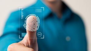 Business,Man,Fingerprint,Scanning,And,Biometric,Authentication,,Cybersecurity,And,Fingerprint,Human,Misconceptions