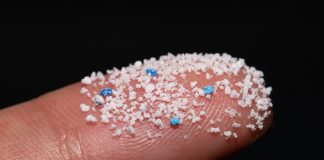 Small,Airborne,Microplastic,Pellets,On,The,Finger.micro,Plastic.,Air,Pollution