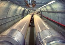 Electron-Ion Collider: Pioneering the next frontier in particle physics The Relativistic Heavy Ion Collider (RHIC) consists of twin rings of superconducting magnets carrying ions (atomic nuclei stripped of their electrons) in opposite directions (see particles collide). The Electron-Ion Collider (EIC) will reuse one of these ion storage rings and add an electron accelerator, an electron storage ring, and other accelerator infrastructure to collide electrons with protons or ions. (Brookhaven National Laboratory)