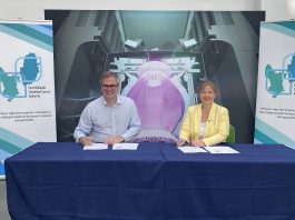 Claire Ward, Mayor of the East Midlands, and Nick Walkden, UKAEA's Head of Fusion Skills, signing the collaboration agreement at the Fusion Energy Cafe in Worksop, Notts. Copyright United Kingdom Atomic Energy Authority.