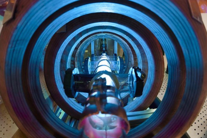 The AWAKE helicon plasma cell prototype as a candidate for scalable plasma sources