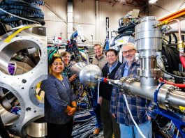 Members of Argonne’s Low-Energy Physics group and ATLAS users from Oak Ridge National Laboratory pose next to GRETINA during its recent installation at the ATLAS user facility. GRETA will eventually incorporate GRETINA​’s detector modules. (Image by Argonne National Laboratory.)