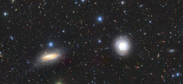 A high-resolution colour image showing the central galaxies NGC5713 and NGC5719 taken by the Hyper Suprime-Cam at the Subaru telescope in Hawaii.