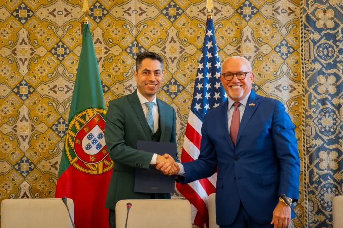 Hugo Costa, executive director for the Portuguese Space Agency, and U.S. Ambassador to Portugal John J. Arrigo pose for a photo on Jan. 12 during a ceremony in Lisbon, Portugal, to mark the country’s signing of the Artemis Accords.